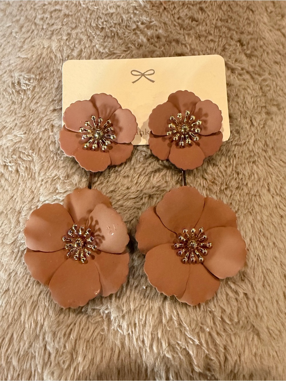 Statement floral earrings in brown